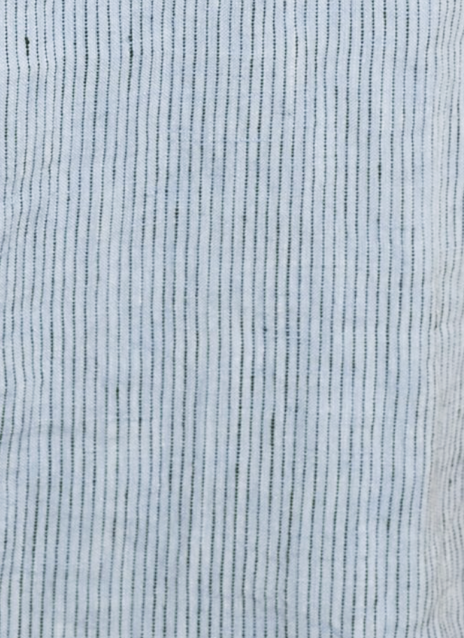 Close-up of Deiji Studios’ Pillow slip set - Blue Stripe, featuring organic linen in light blue with thin, evenly spaced vertical black stripes and a naturally textured finish.