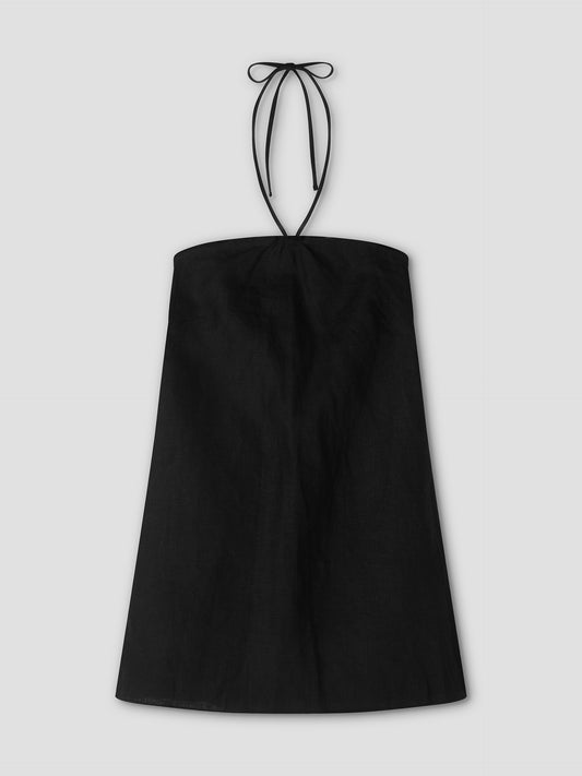 The Cross Over Dress - Black by Deiji Studios is a sleeveless mini dress with a straight neckline and thin neck ties, shown against a plain light gray background.