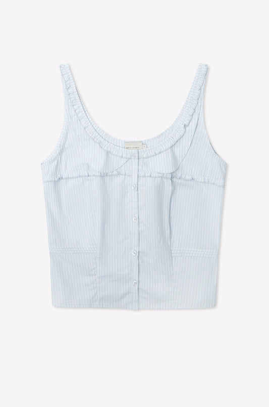 The Frills Top - Mist Stripe by Deiji Studios is a light blue and white pinstriped cotton poplin crop tank with a scoop neckline, front buttons, sleeveless cut, and subtle frill detailing, shown on a plain white background.