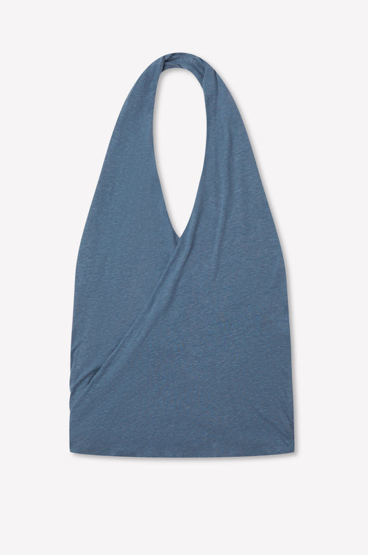 The Double Layer Jersey Halter - Blue by Deiji Studios is a sleeveless top with a V-neck and draped wrap-style front, crafted from soft double-layer jersey and shown flat on a light background.