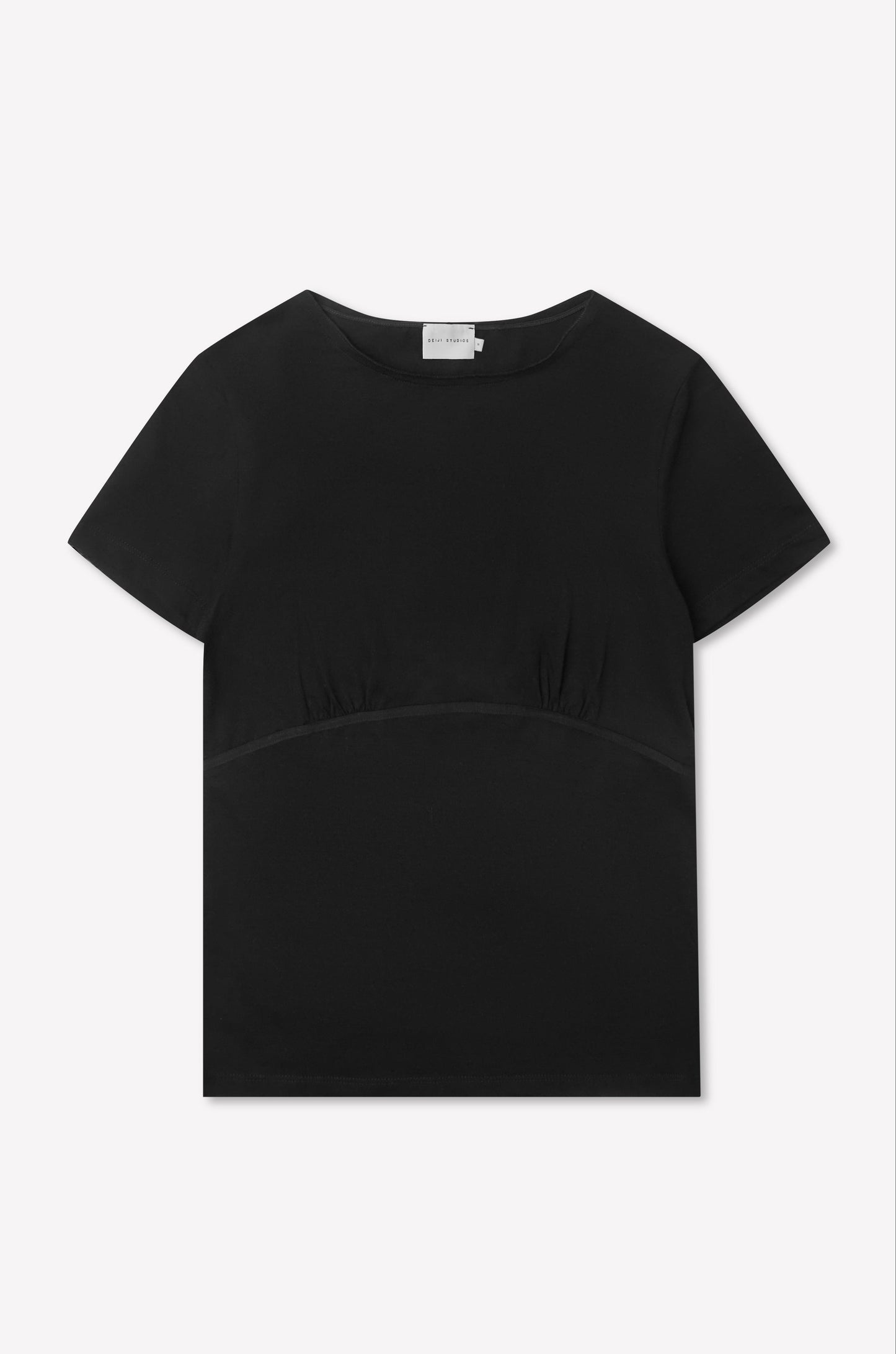 The Tape Tee - Black is a fitted plain black tee featuring short sleeves, a round neckline, and subtle gathered detailing below the bust, shown against a white background.
