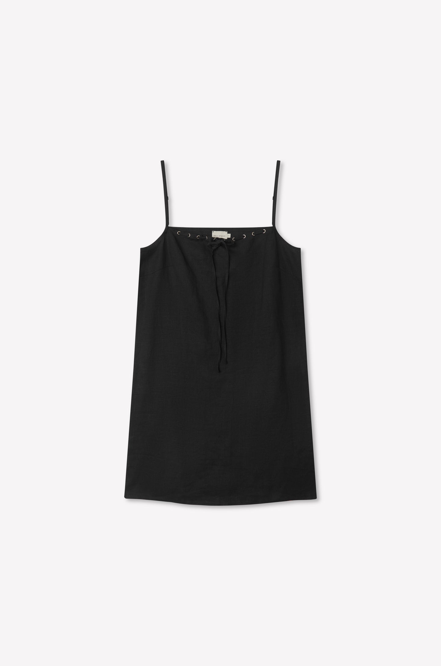 The Weave Mini - Black is a sleeveless camisole top with thin adjustable straps and a tie detail at the neckline, shown on a plain white background.