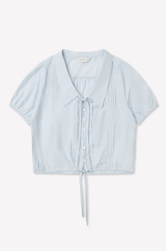 The Fine Collar Top - Mist Stripe features a light blue vertical stripe design, short sleeves, fine collar, button-down front, and drawstring waist. Made from lightweight cotton poplin for a casual, airy look inspired by Deiji Studios.