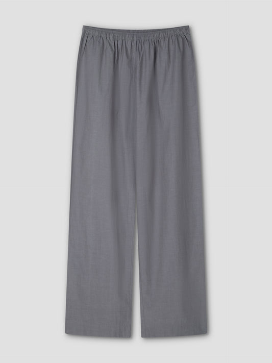 The Ease Trouser - Currant by Deiji Studios is a loose-fitting, wide-leg pant with an elastic waistband and ankle length, shown flat on a light gray background.