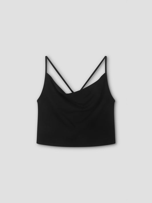 The Drape Jersey Top - Black is a lightweight sleeveless jersey top with thin spaghetti straps and a gently draped neckline, shown on a plain light gray background, reflecting Deiji Studios’ minimal aesthetic.