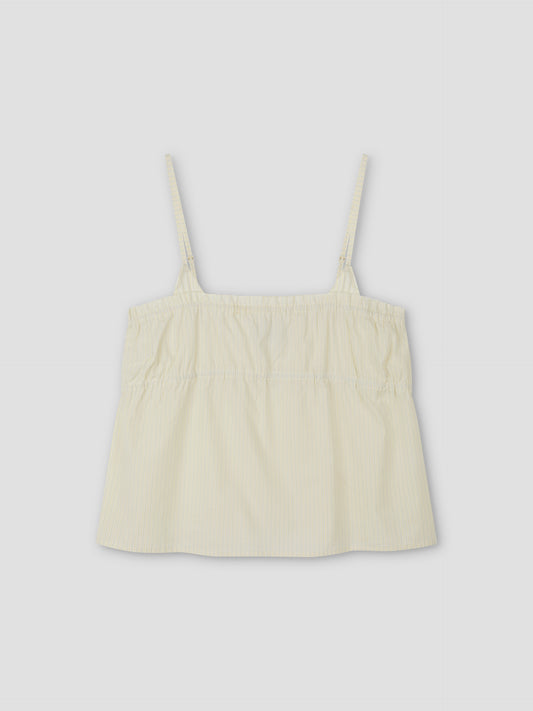 The Tri Cami - Citrus Stripe by Deiji Studios is a light yellow, sleeveless top with thin adjustable straps, a loose gathered fit, and lightweight fabric, shown against a plain light gray background.