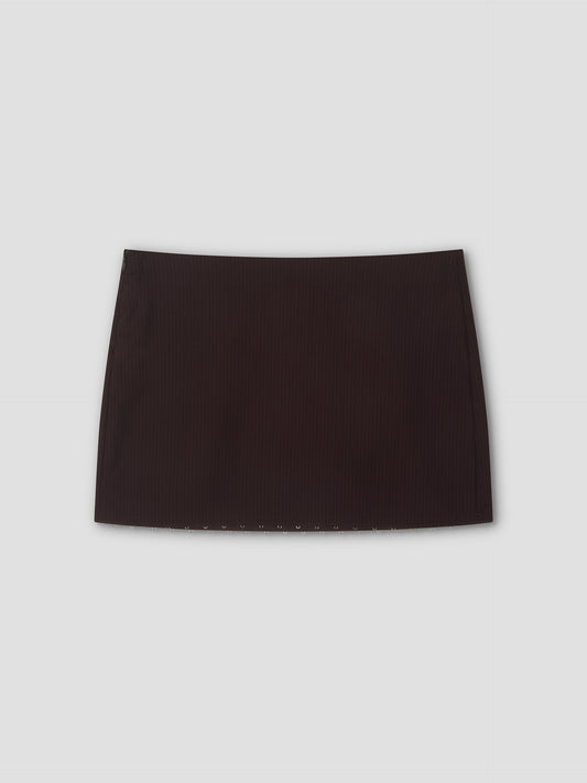 A mini-length Eye Skirt in burgundy brown stripes with a straight cut, displayed against a light gray background.