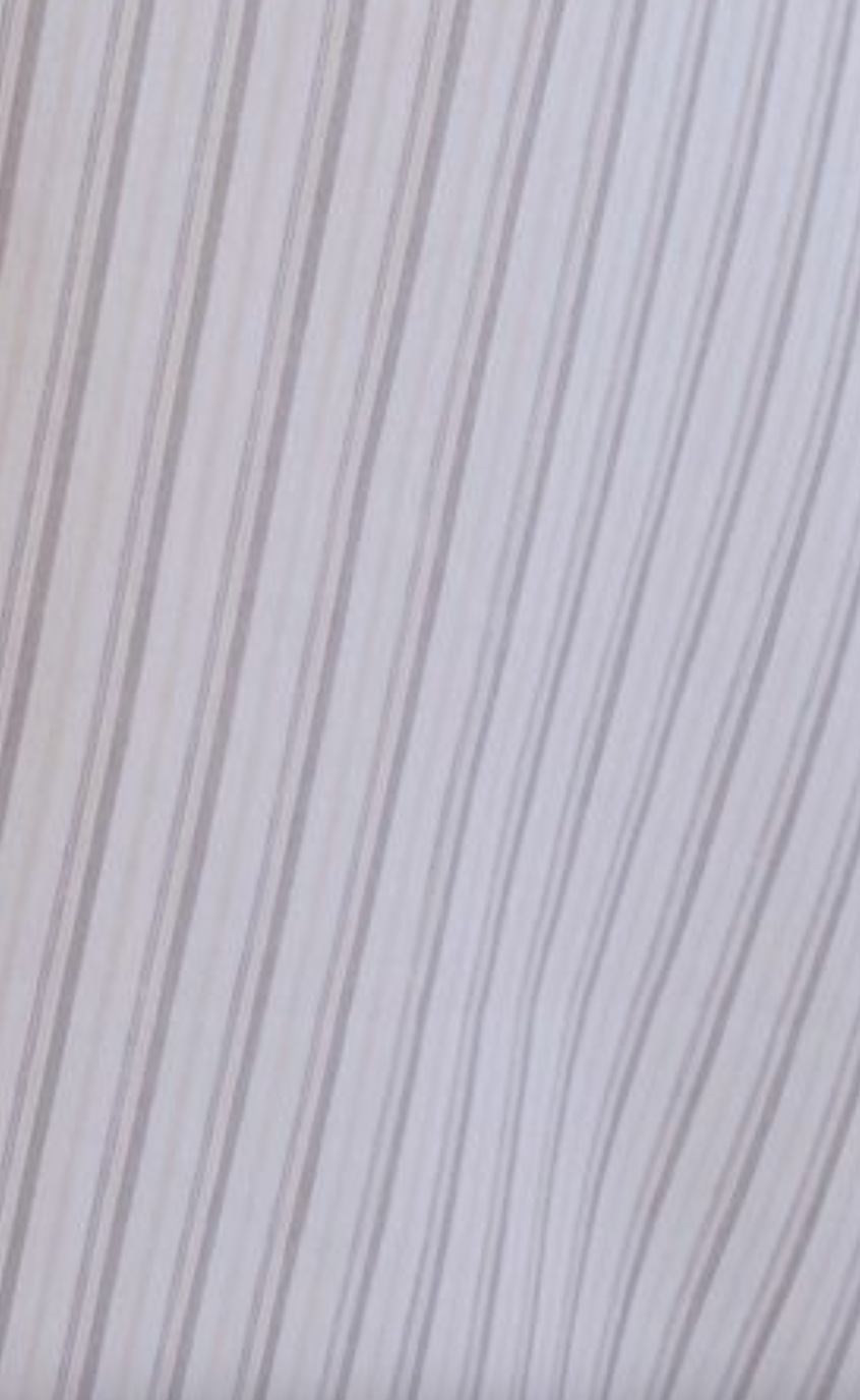 The Double Collar Shirt - Gull Stripe by Deiji Studios features light fabric with thin, wavy beige and gray stripes for a subtle, flowing look—perfectly capturing the brand’s signature style.
