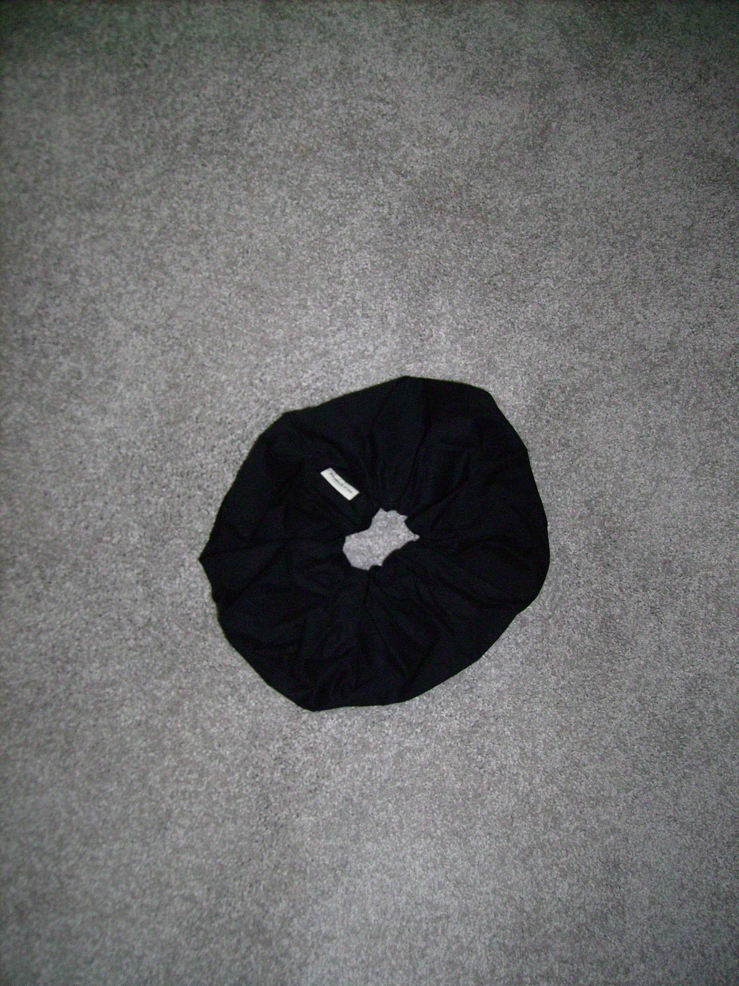 Scrunchie - black by Deiji Studios on grey carpet