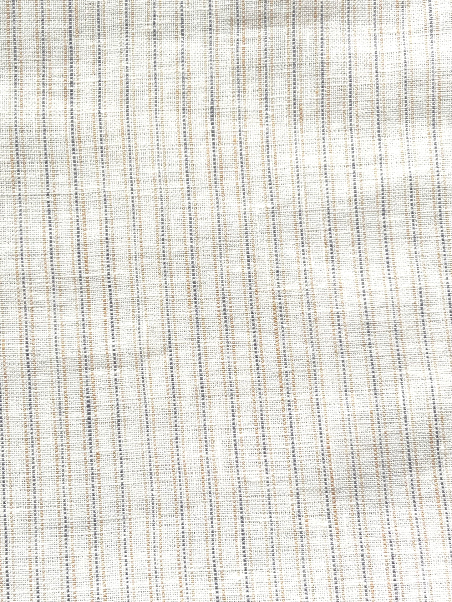 Close-up of the Tie Split Set - Linen Story Stripe, showcasing soft woven fabric with a light beige base and thin blue and tan stripes—ideal for creating effortless, organic linen style.