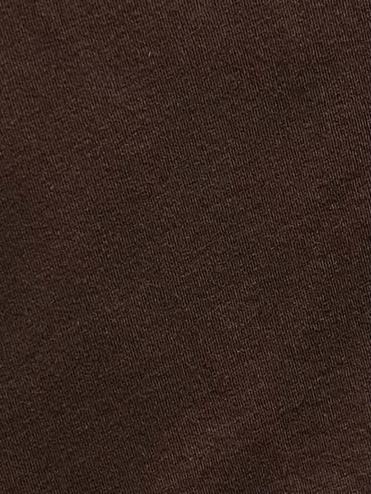 Close-up of the Simple Tee - Caribou, crafted from brown organic cotton with a slightly diagonal weave pattern that highlights its texture and fine threads—a signature detail from Deiji Studios.