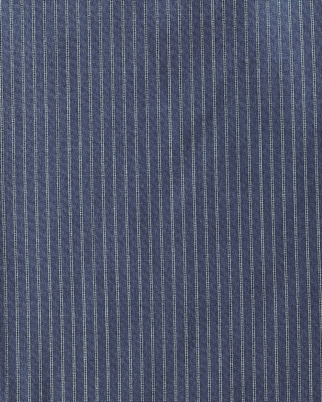Close-up of 0 Folded Wool Pant - Navy Stripe fabric, featuring visible texture and weave with evenly spaced, thin white pinstripes—perfect for relaxed straight leg or folded pant styles.
