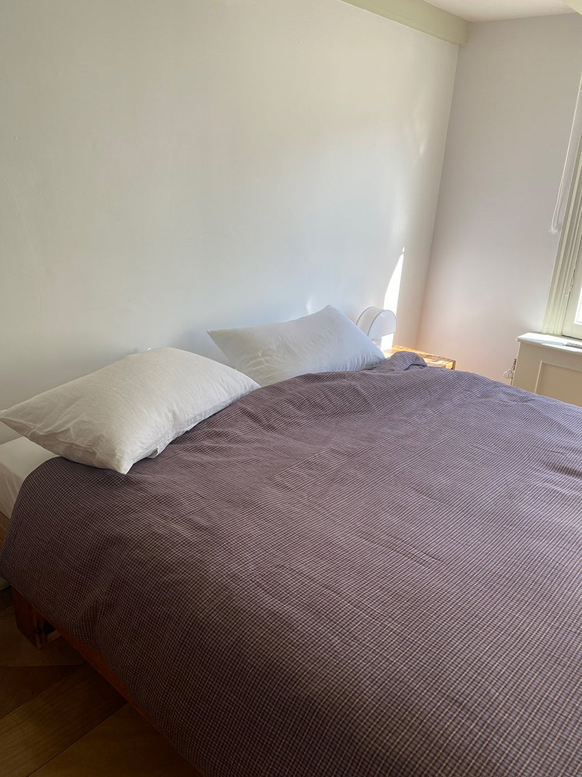 Light room with queen bed topped with Duvet cover - russet check by Deiji Studios