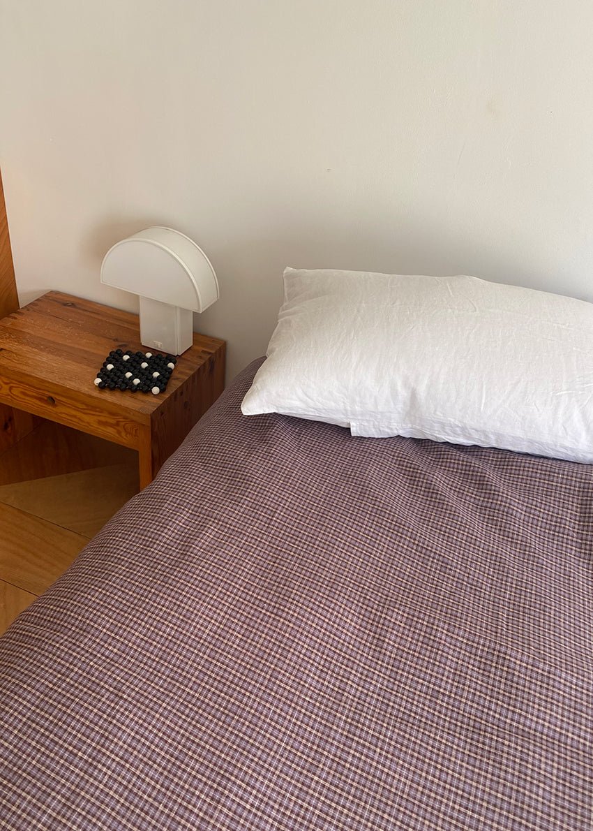 Light room with queen bed and pillows topped with Pillow slip set - White by Deiji Studios
