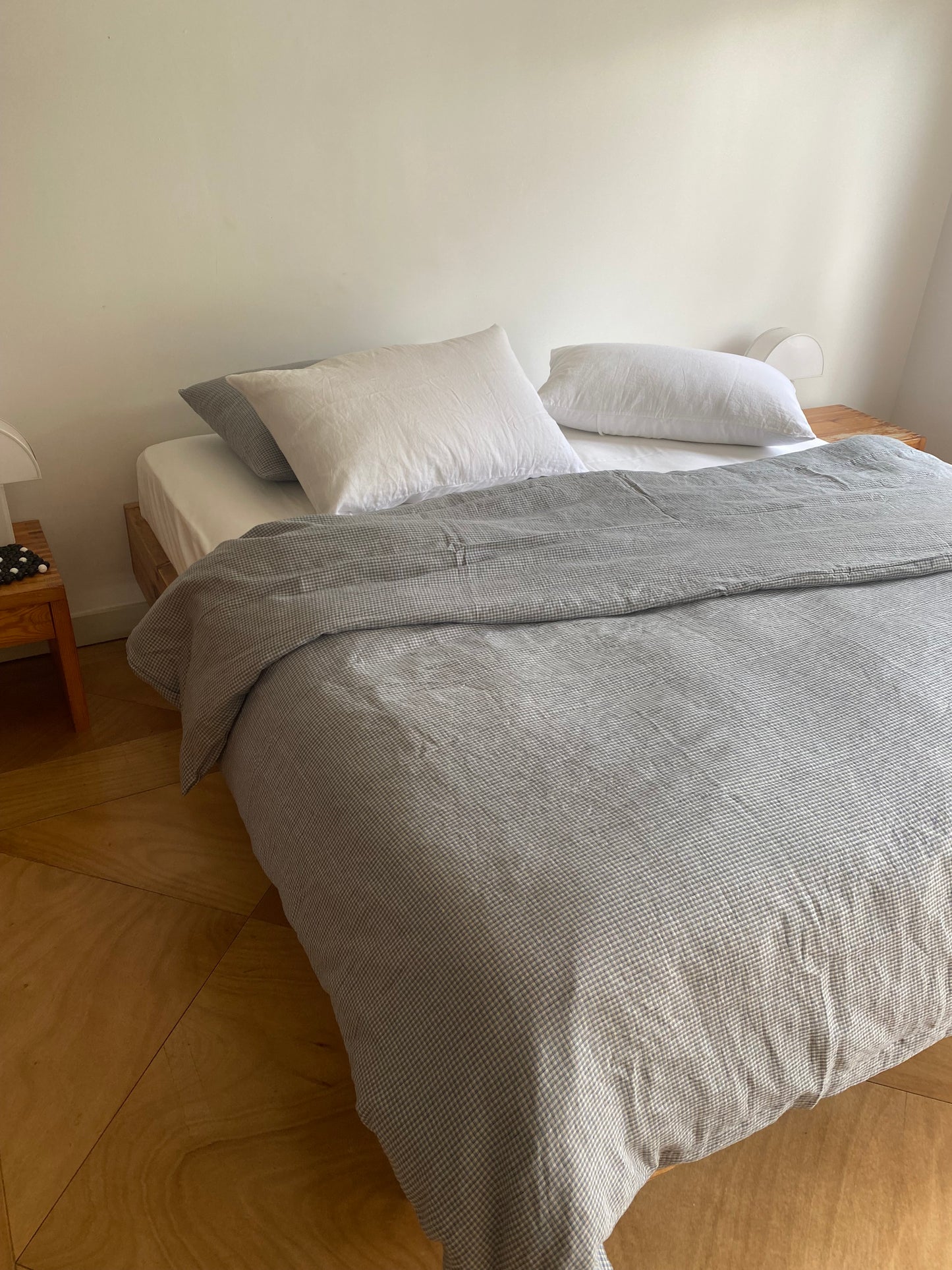 Light room with queen bed topped with Duvet cover - field check by Deiji Studios