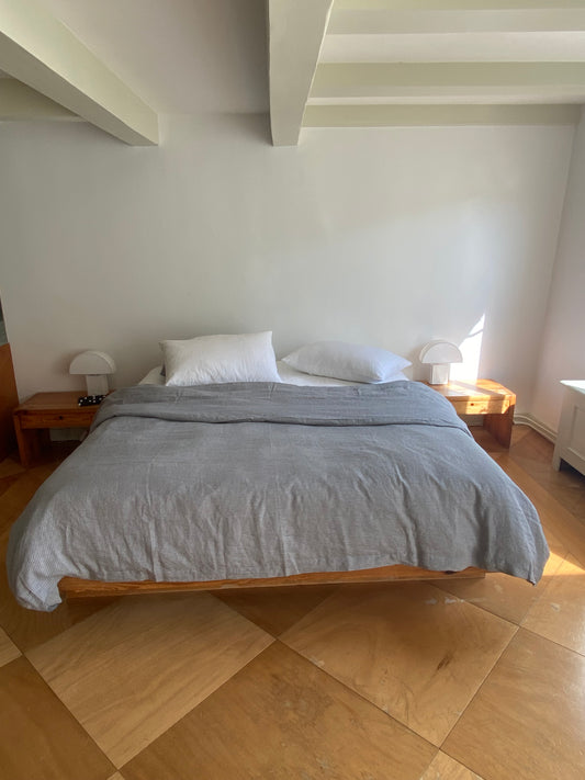 Light room with queen bed topped with Duvet cover - field check by Deiji Studios