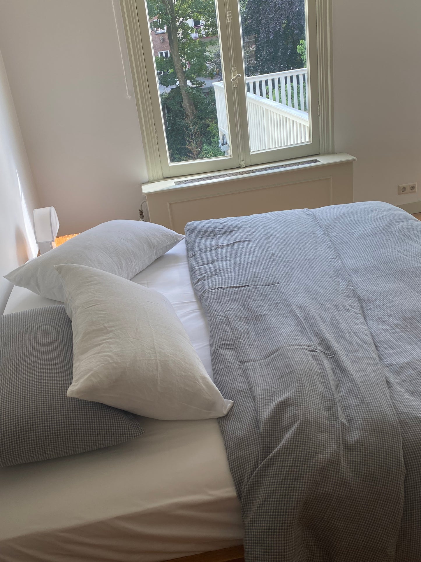 Light room with queen bed topped with Duvet cover - field check by Deiji Studios
