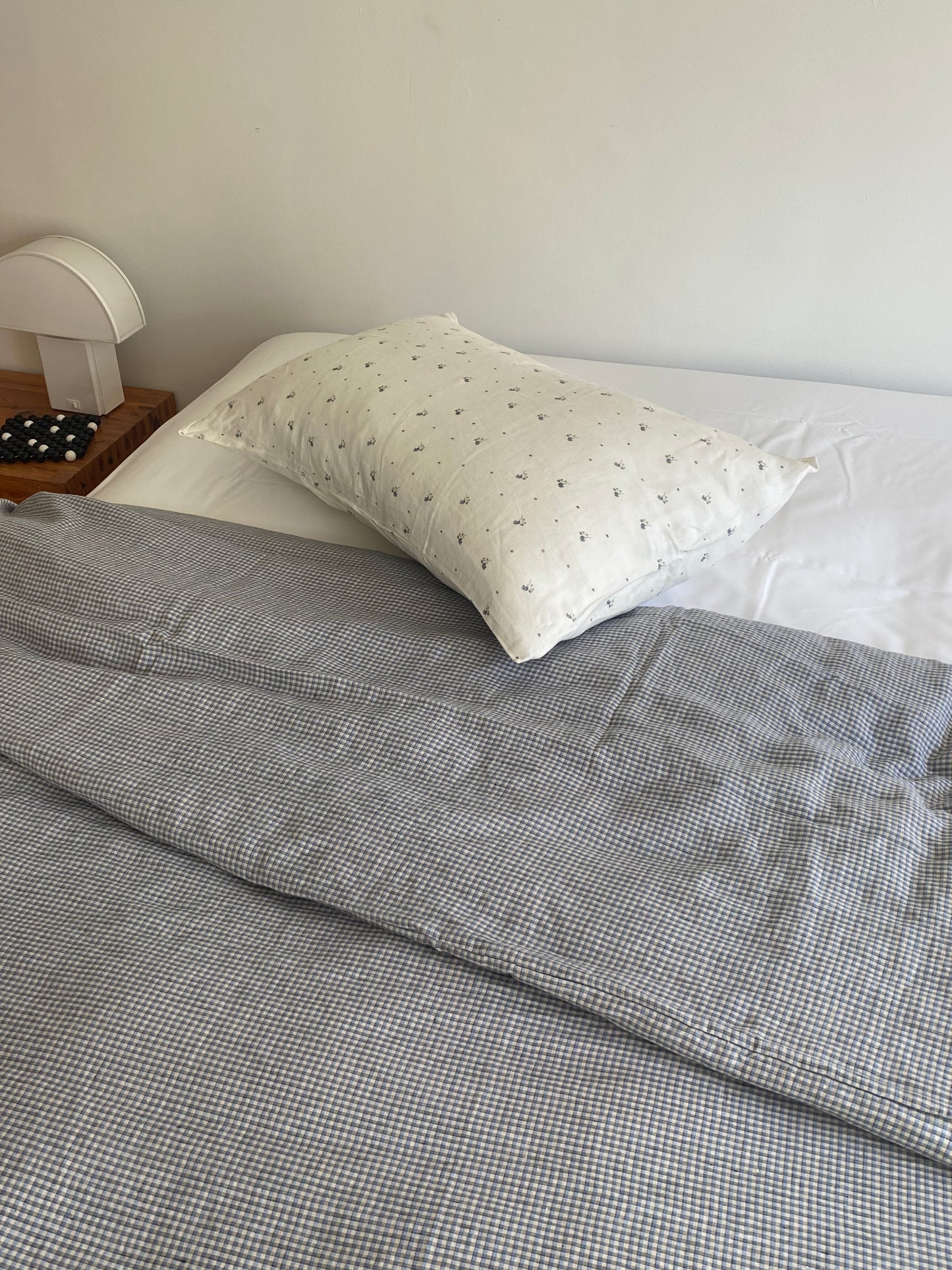 Light room with queen bed topped with Duvet cover - field check by Deiji Studios