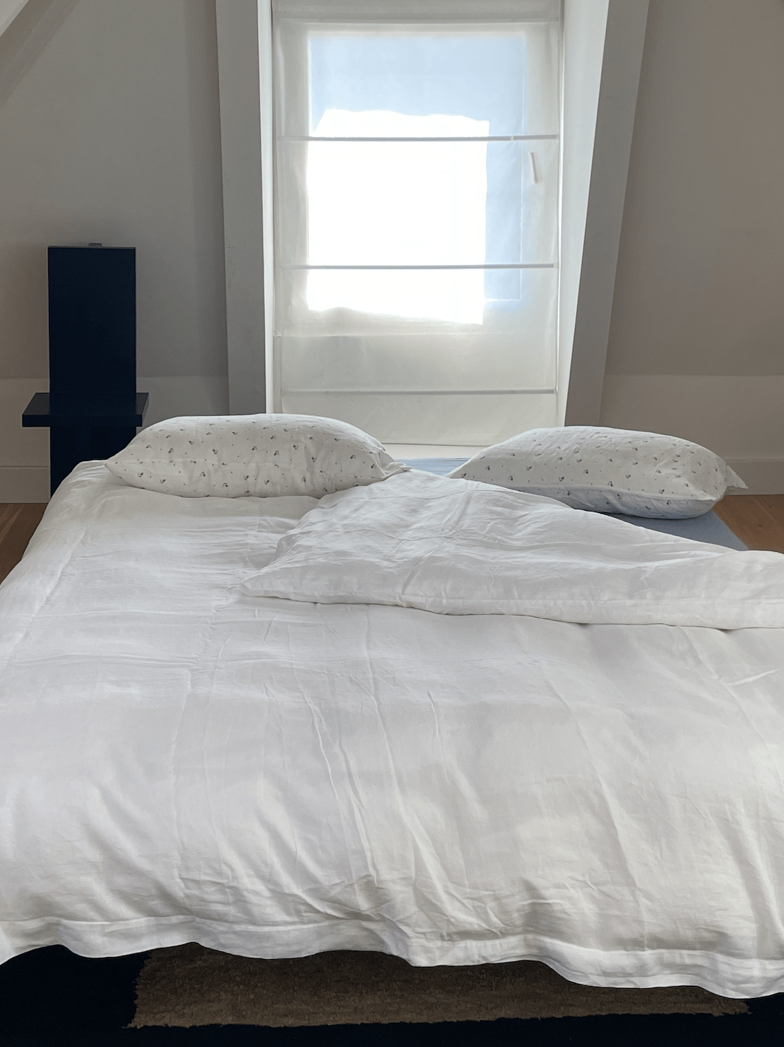 Light room with queen bed topped with Duvet cover - White by Deiji Studios