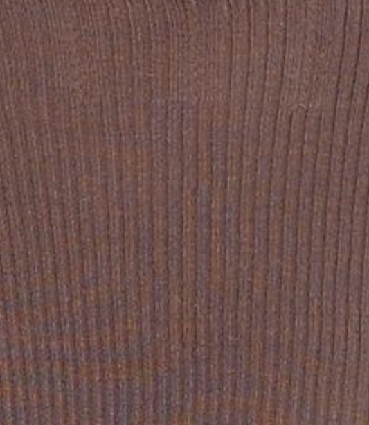 Close-up of the Open Work Longsleeve - Hazel, featuring a brown wood-like surface with vertical grain lines and natural texture, echoing the delicate pattern of the sheer fine knit top.
