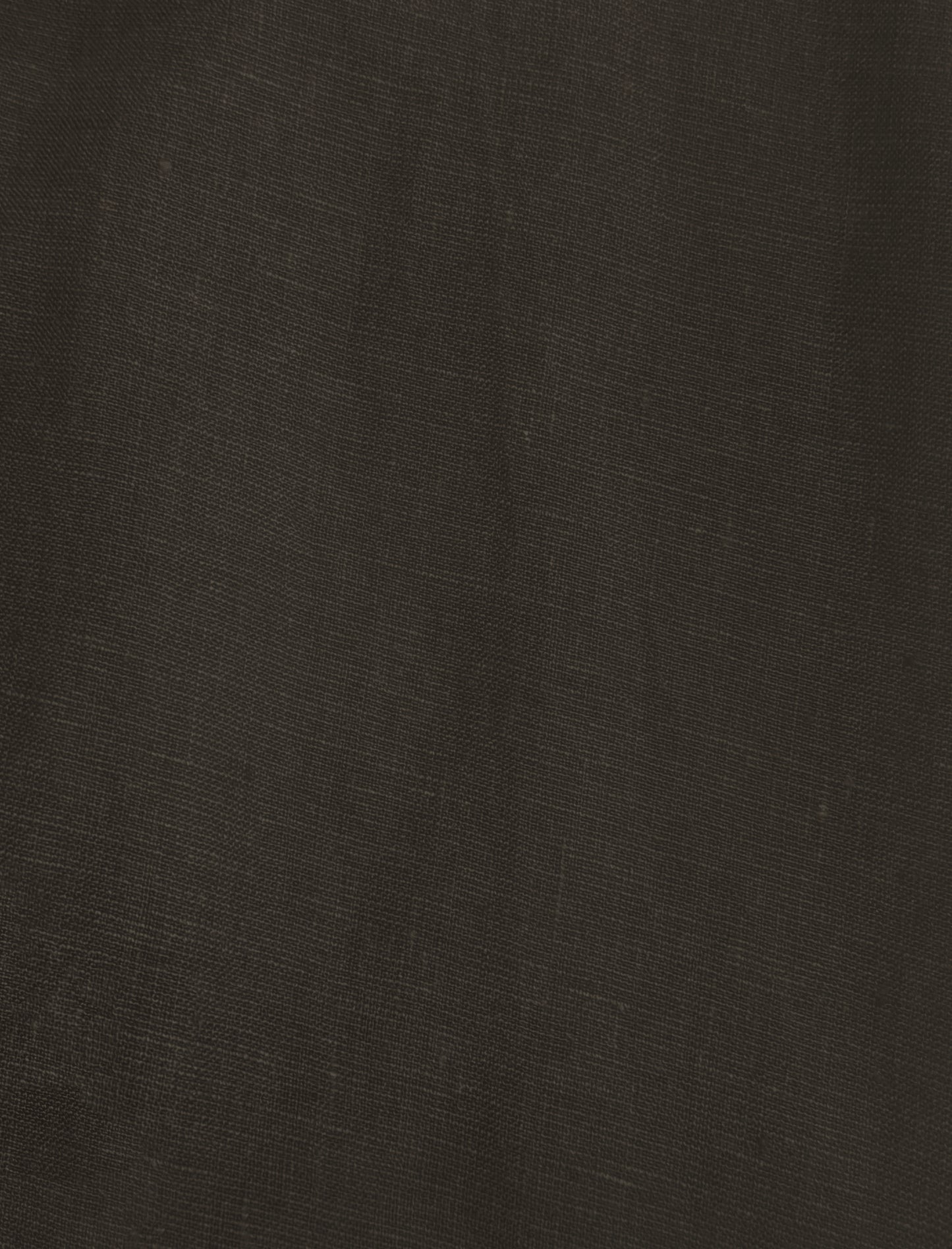 Close-up of Sheets - Bark shows dark brown woven fabric with a fine weave and subtle natural creases, reminiscent of eco-friendly linen.