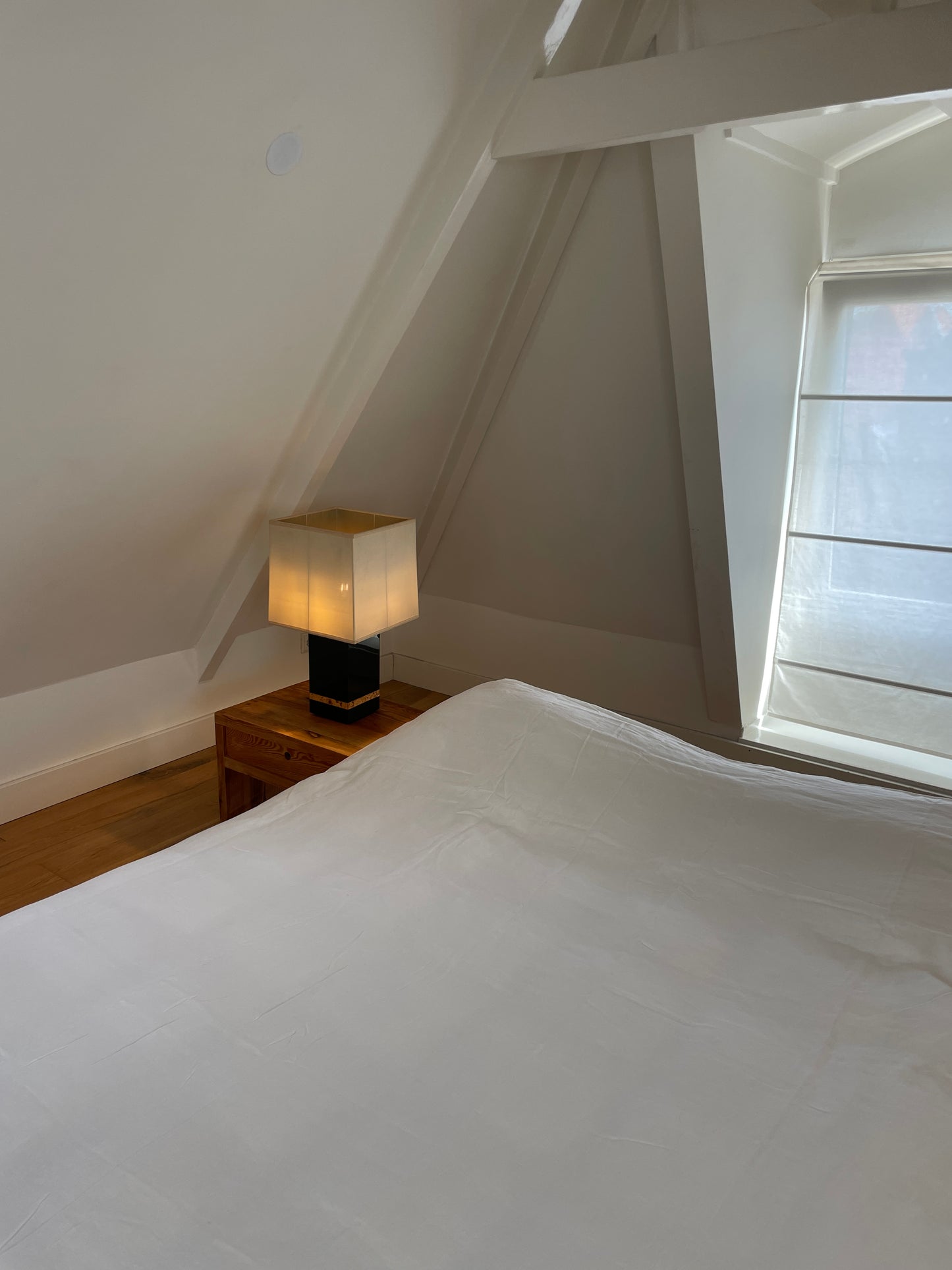 Light room with queen bed topped with Duvet cover - White by Deiji Studios