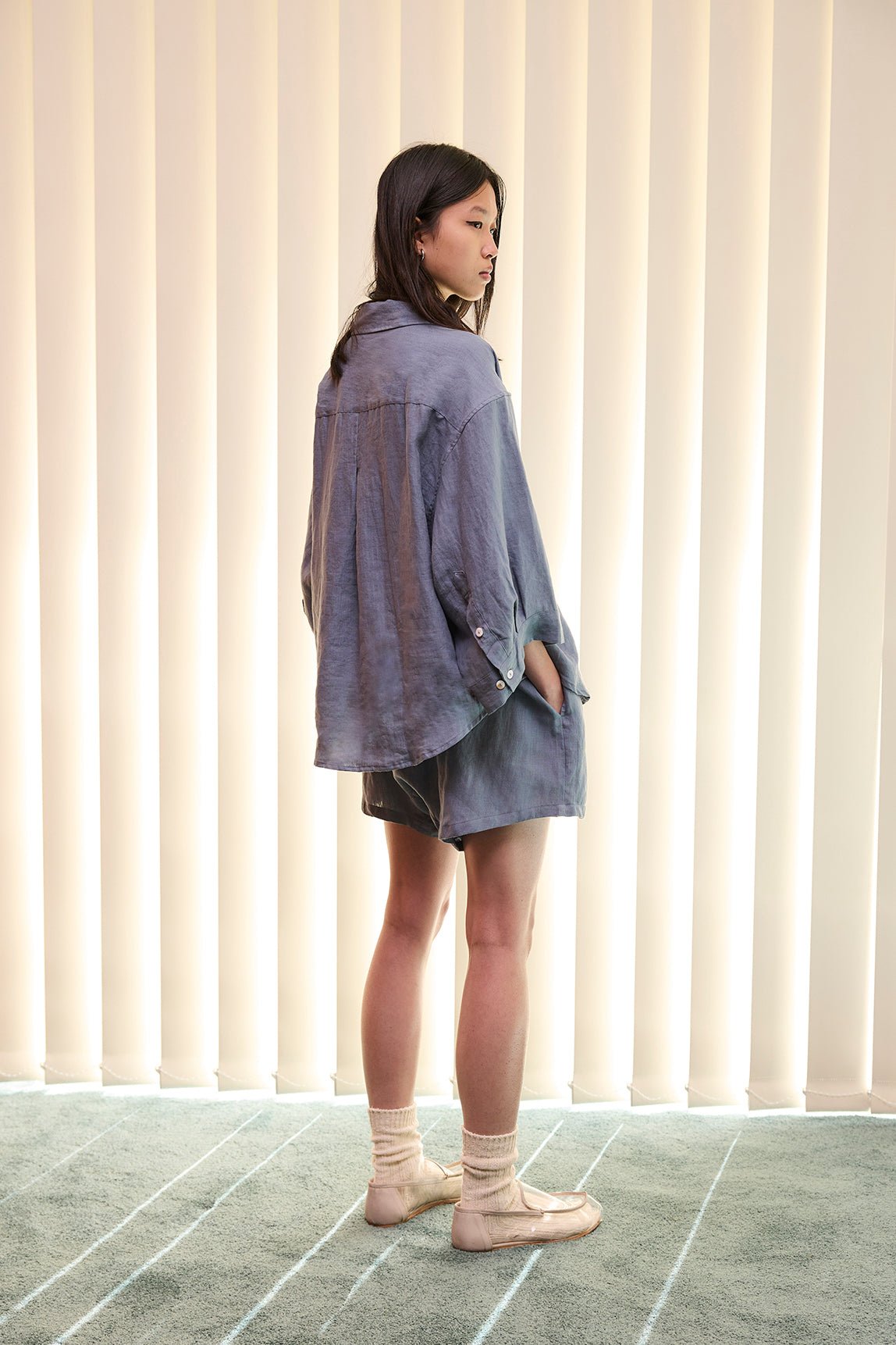 the 03 set by Deiji Studios in air   features an oversized box fit linen shirt with wide arms and a front pocket  designed to sit mid rise, the loose fitting boxer style shorts have a faux button down fly and an elastic waist for extra comfort   made from 100% OEKO-TEX 100 certified and EU certified stone washed french linen