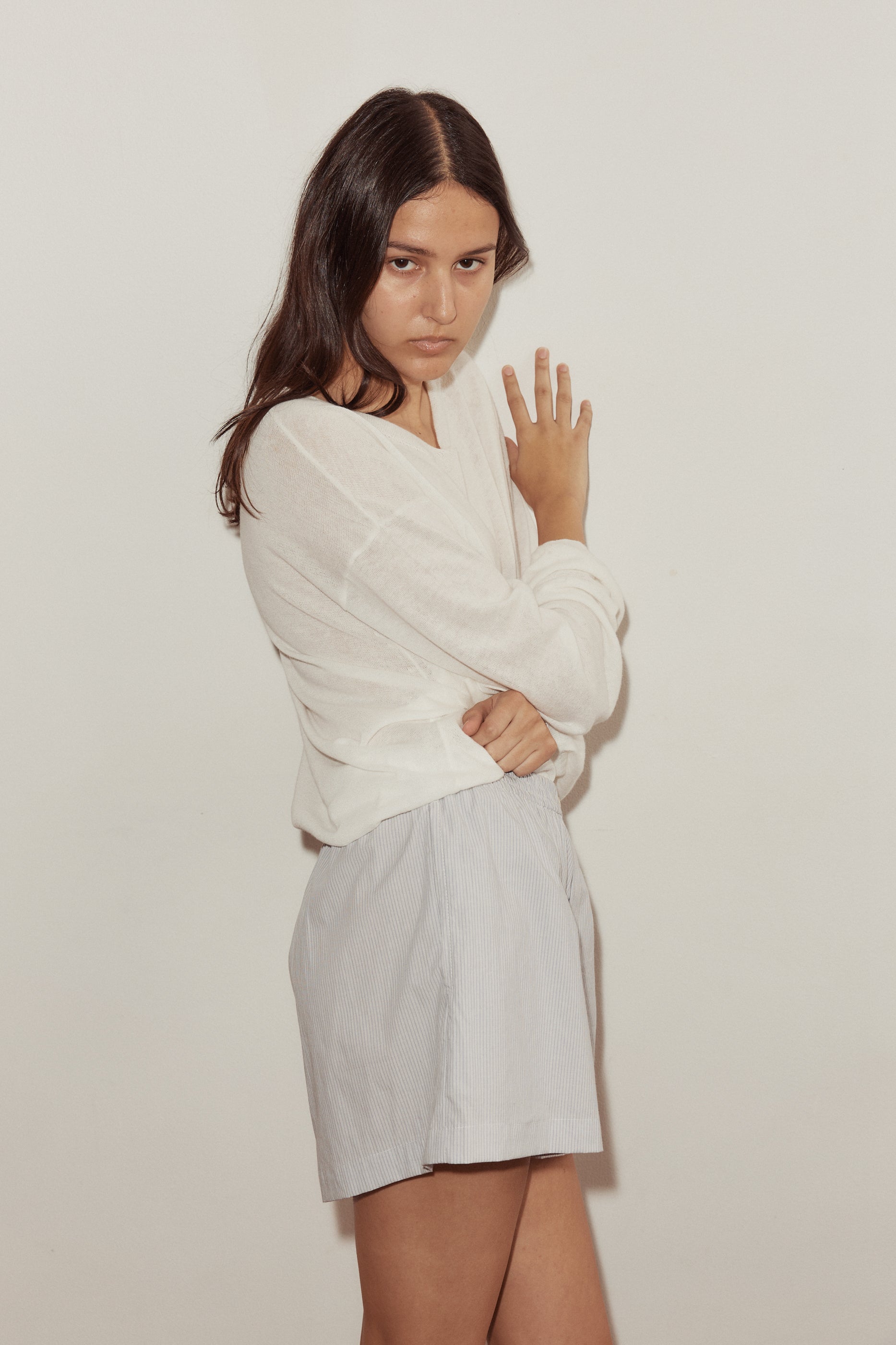 Female model wearing The Boxer - Dream Stripe by Deiji Studios against plain background