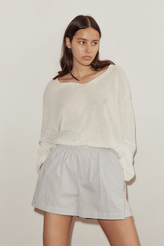 Female model wearing The Boxer - Dream Stripe by Deiji Studios against plain background