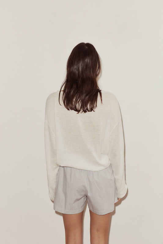 Female model wearing The Boxer - Dream Stripe by Deiji Studios against plain background