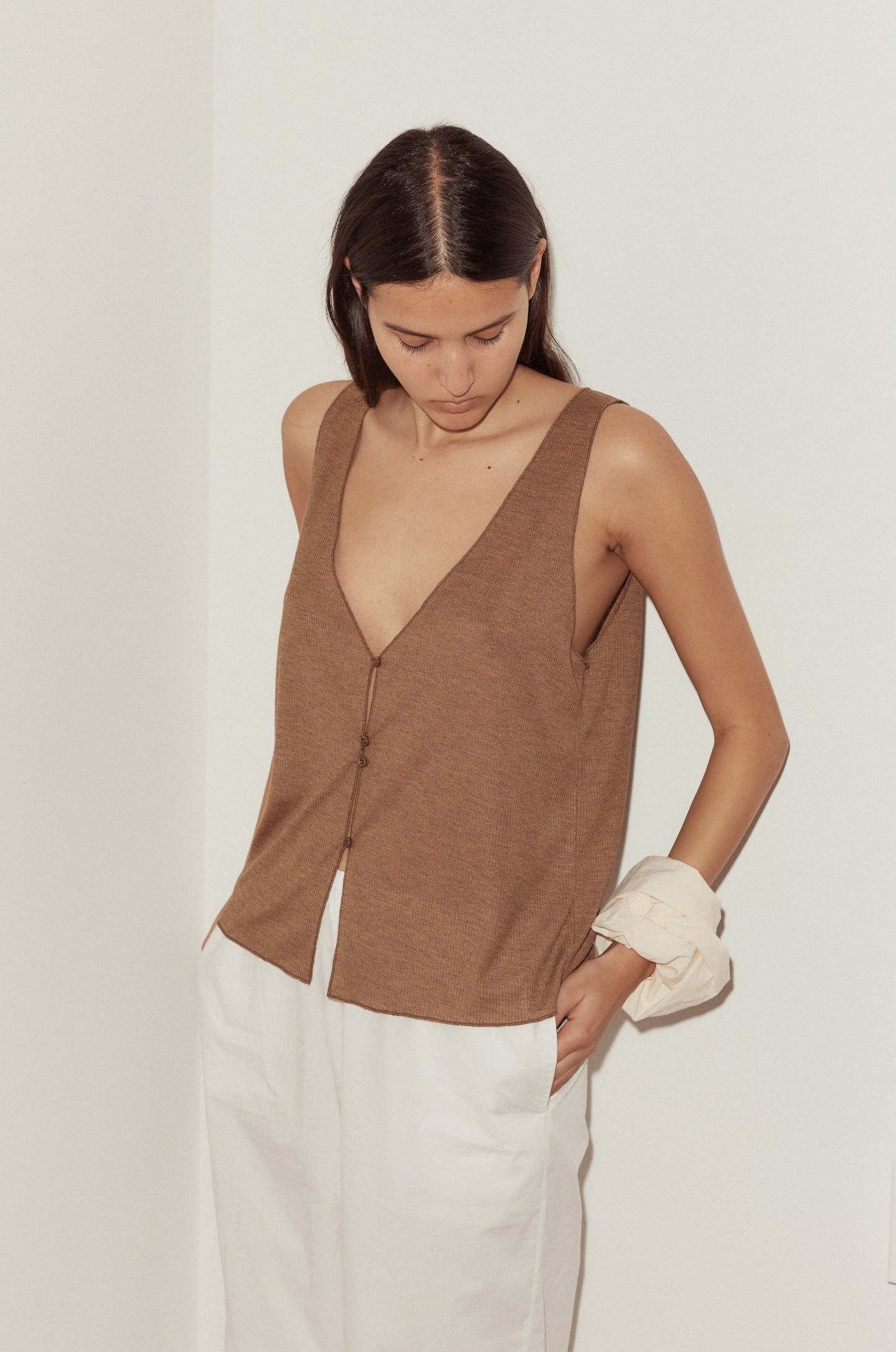 Female model wearing Button Up Knit Tank - Coffee by Deiji Studios against plain background