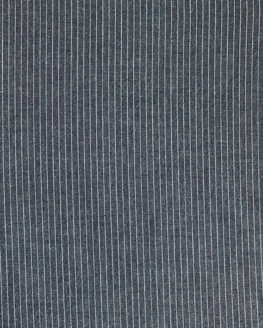 The Ease Trouser - Blue Pinstripe features smooth, soft organic cotton with thin vertical white pinstripes, an elastic waist, and a relaxed fit—combining comfort and style for everyday wear.