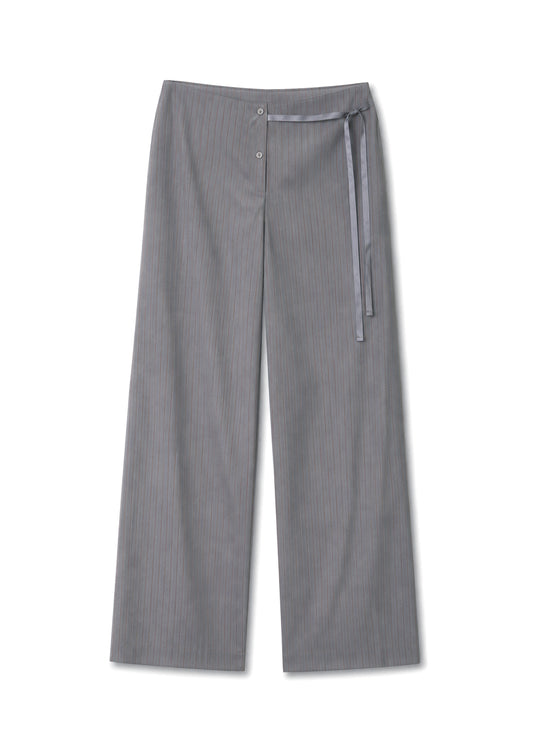 The Boxer Pant - Grey Stripe features a wide-leg, high-waisted design with subtle vertical pinstripes, side button closure, and a thin tie at the relaxed elasticated waistband, shown laid flat on a white background.