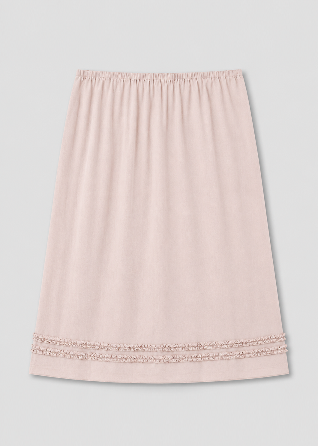 The Daytime Skirt - Floss is a light pink, knee-length cotton voile skirt with an elastic waistband and two rows of lace trim near the hem, shown on a plain white background—ideal for daytime wear.