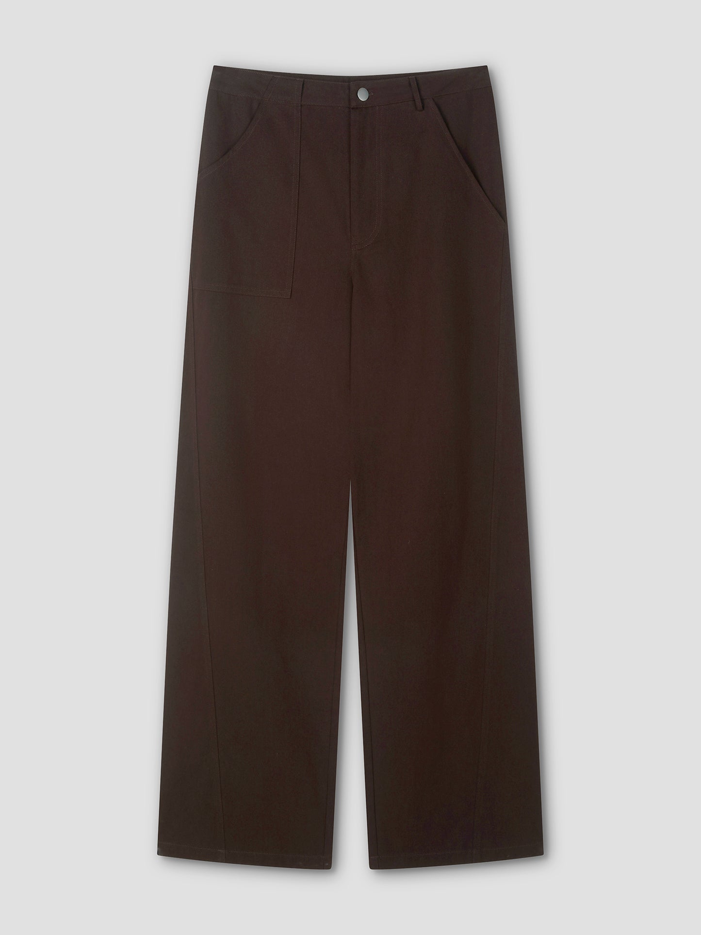 A pair of Pocket Jean wide-leg, dark brown pants with a high waist, front button closure, and side pockets is displayed flat on a light gray background.