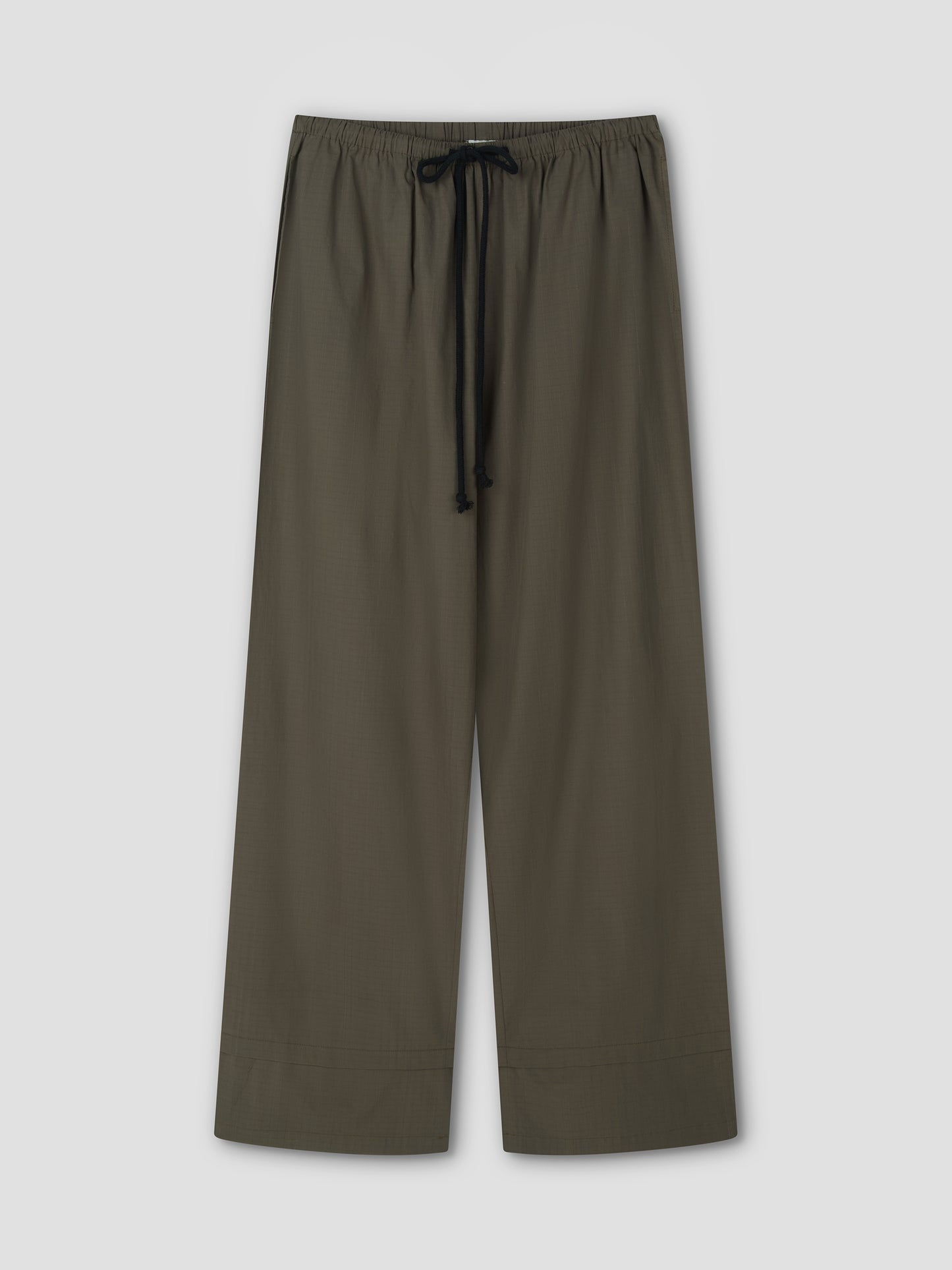 Loose-fitting Layered Pant - Khaki Check featuring a wide leg, elastic waistband, and black drawstring, displayed flat on a light gray background.