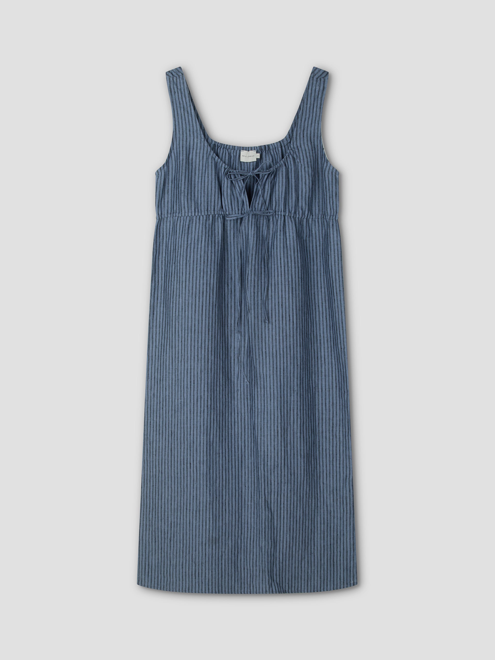 Sleeveless Cord Dress - Azure Stripe: a blue and white striped midi dress with a square neckline, gathered bust, and front drawstring tie, displayed flat on a light gray background. Inspired by Deiji Studios’ effortless style.
