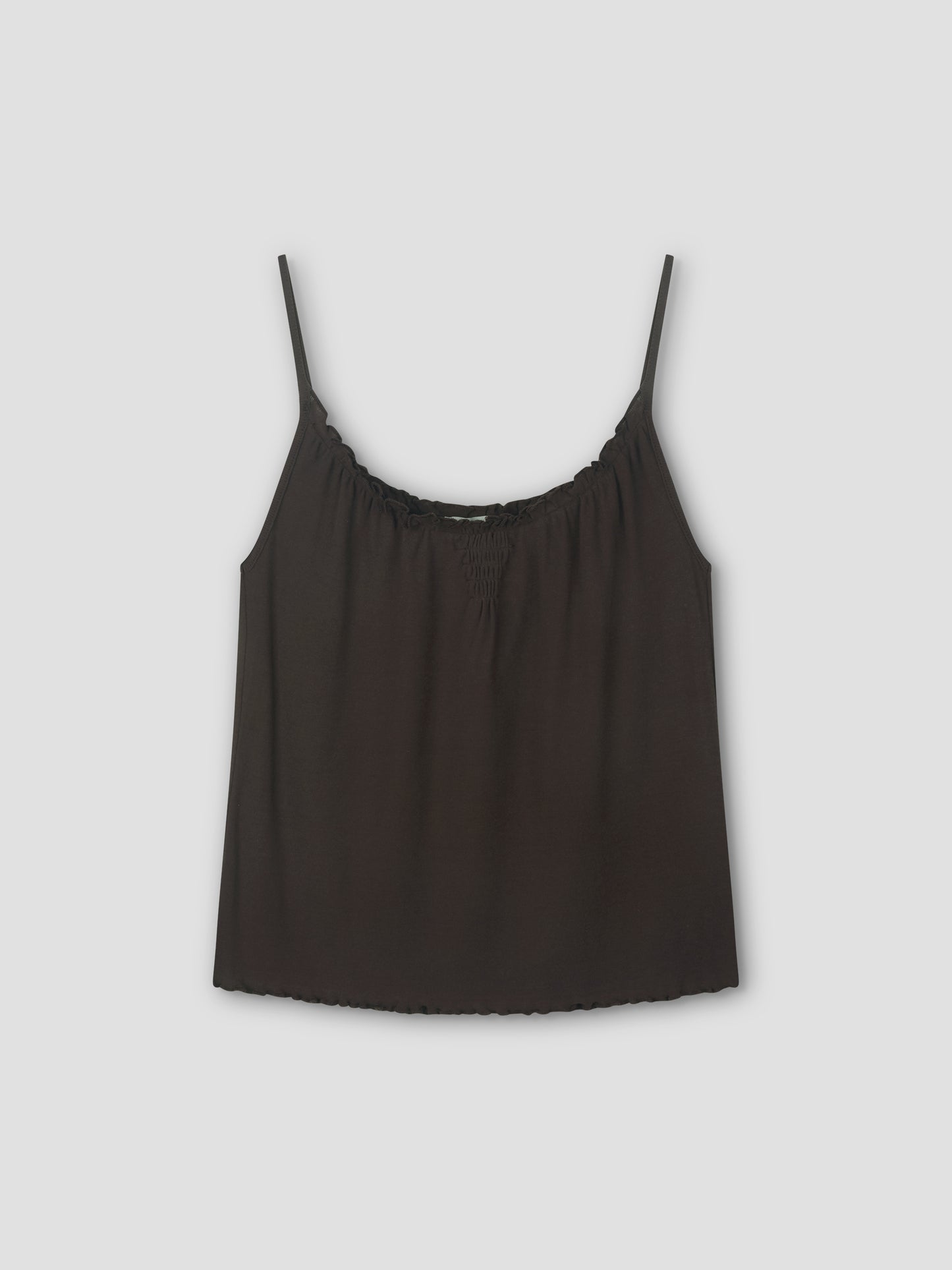 A brown Cotton Flounce Tank with spaghetti straps, relaxed fit, and subtle neckline gathers is shown on a plain light gray background.