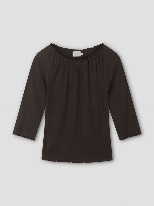 A brown, cotton flounce 3/4 sleeve top with an elastic neckline and ruffled edges on the sleeves and hem, laid flat on a light gray background.