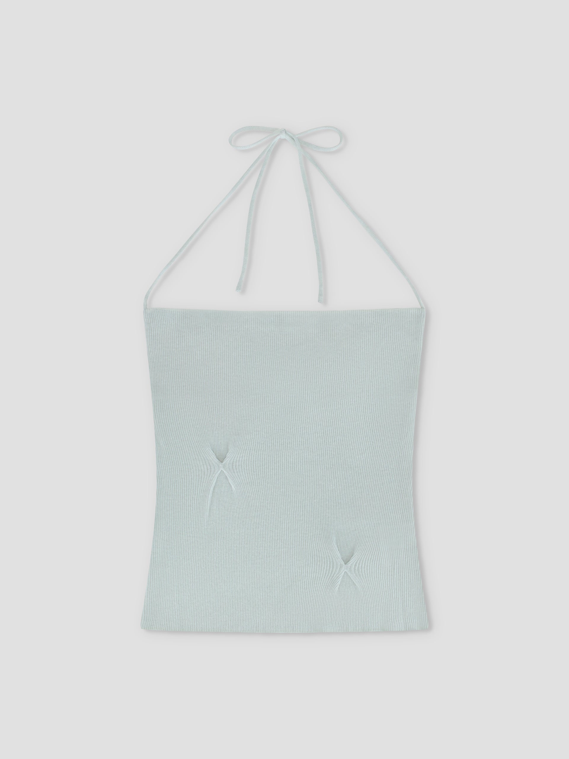 The Fine Knot Tank - Ice Blue by Deiji Studios is a light blue halter tank with thin neck tie straps and two subtle star-shaped gathers on the front, crafted from recycled polyester and shown laid flat on a white background.
