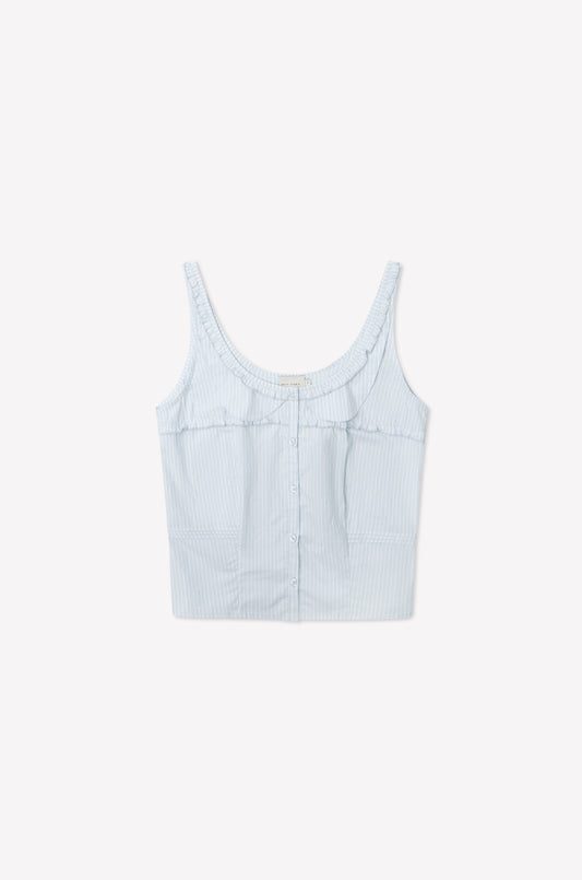 The Frills Top - Mist Stripe by Deiji Studios is a light blue and white pinstriped cotton poplin crop tank with a scoop neckline, front buttons, sleeveless cut, and subtle frill detailing, shown on a plain white background.