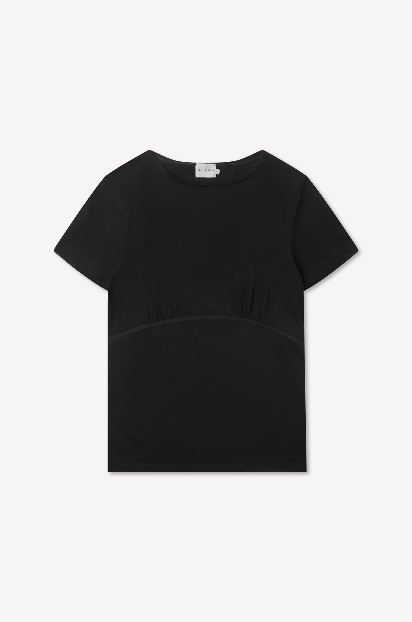 The Tape Tee - Black is a fitted plain black tee featuring short sleeves, a round neckline, and subtle gathered detailing below the bust, shown against a white background.