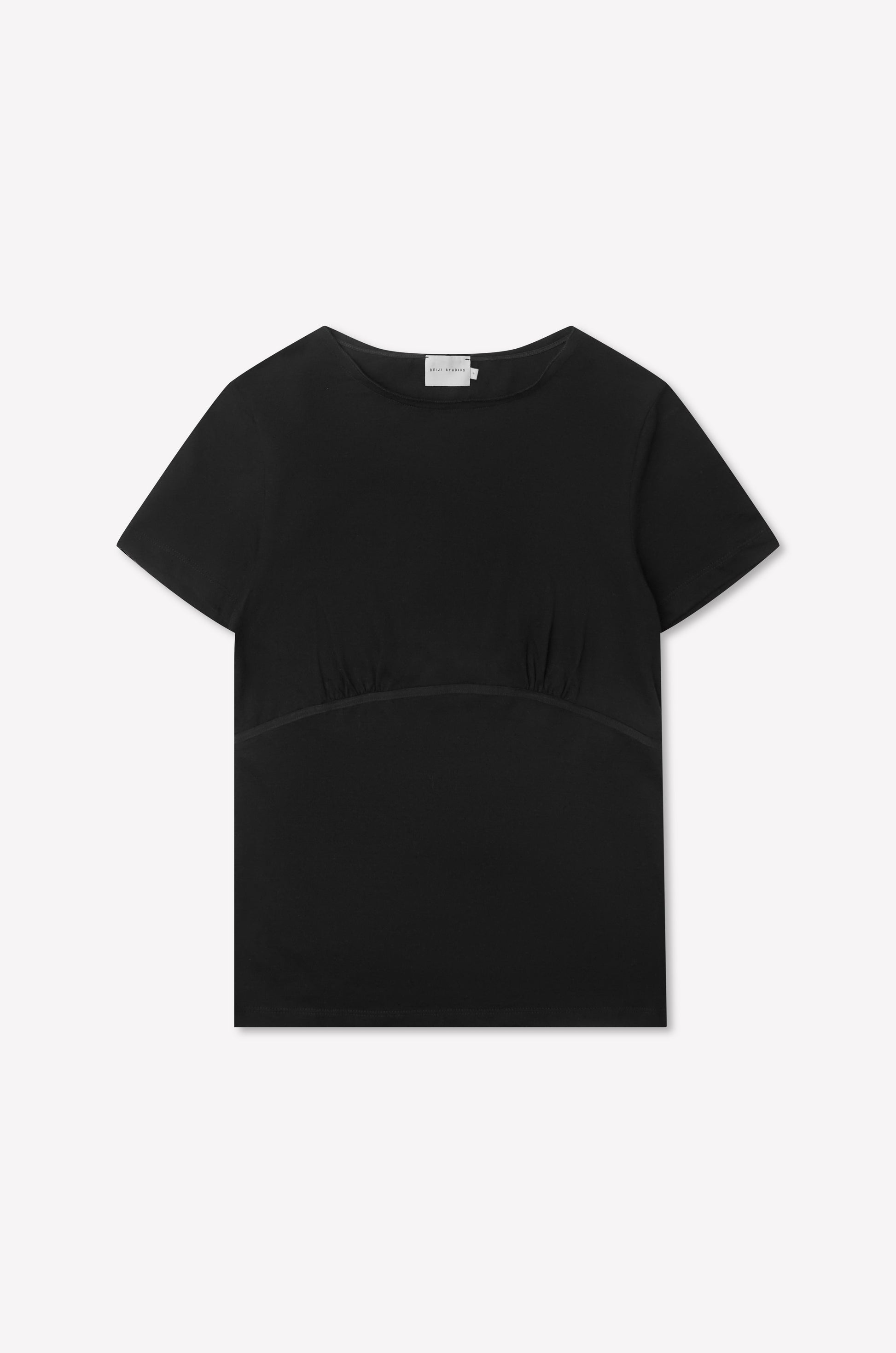 The Tape Tee - Black is a fitted plain black tee featuring short sleeves, a round neckline, and subtle gathered detailing below the bust, shown against a white background.