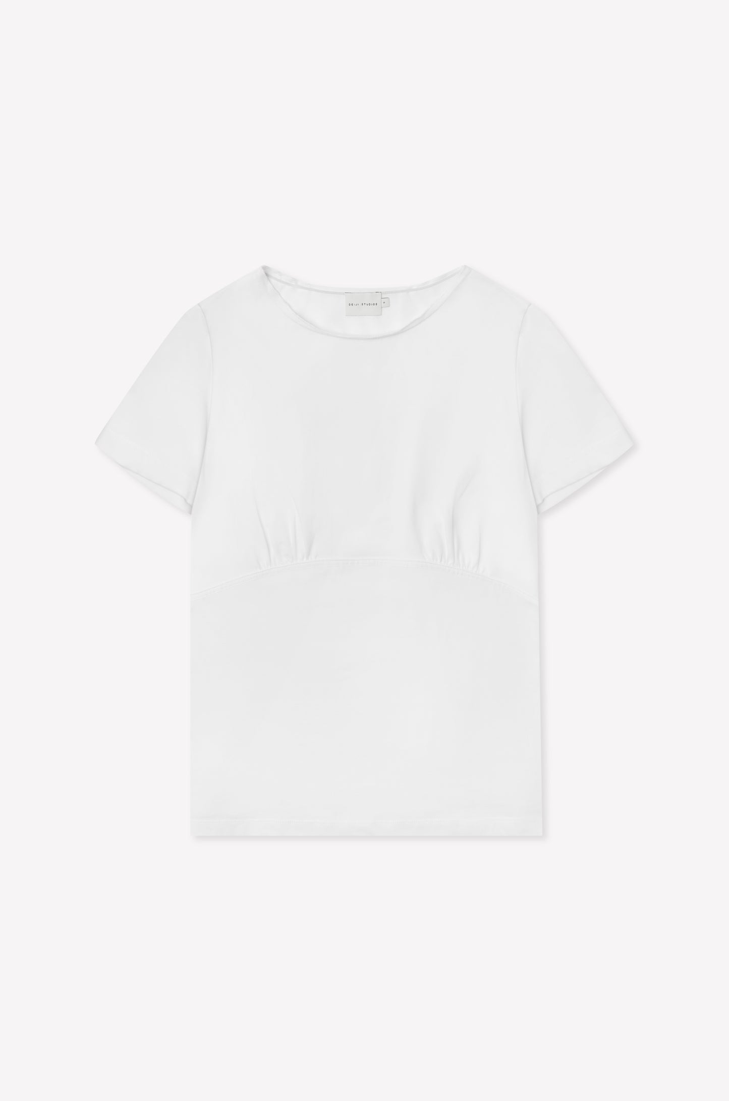 The Tape Tee - White by Deiji Studios is a fitted short sleeve top with a round neckline and subtle seam detailing under the bust, shown laid flat on a white background.