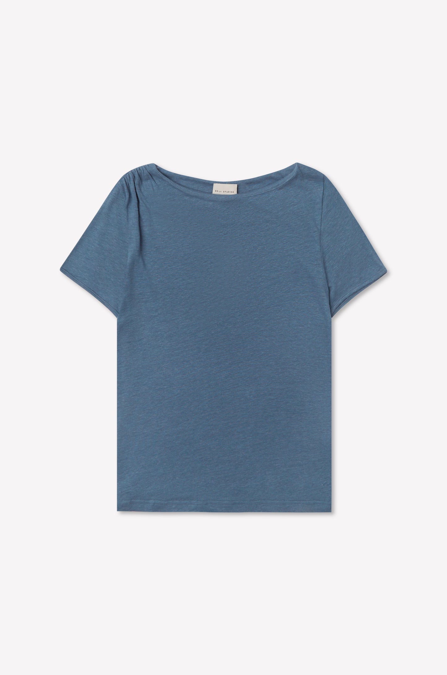 The Drape Tee - Blue features a plain design with short sleeves and a boat neckline, shown against a white background.