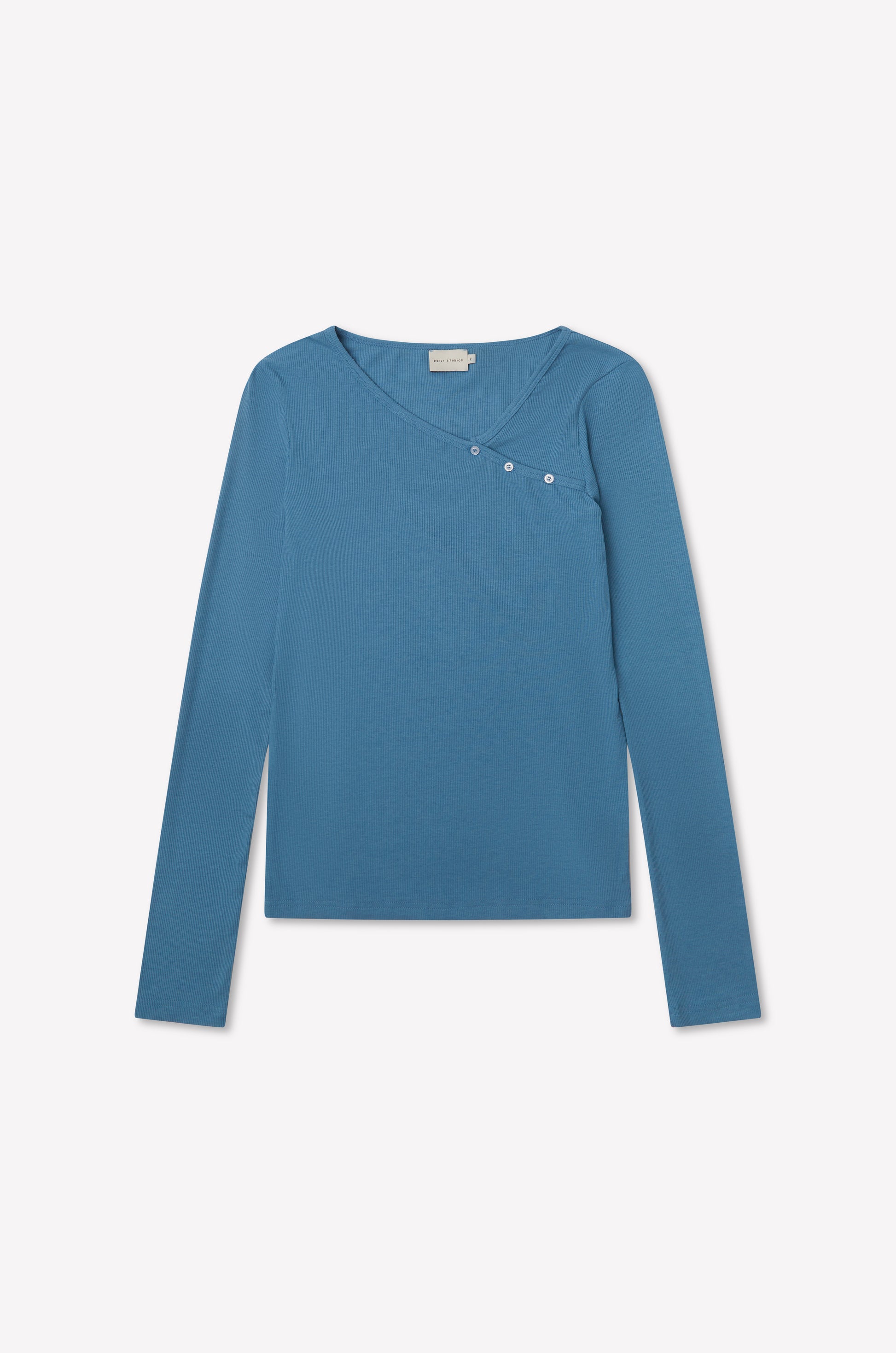 The Multi Button Top - Aqua by deiji studios is a fitted long sleeve jersey in blue with an asymmetrical neckline and three small buttons on the upper right, shown on a plain white background.