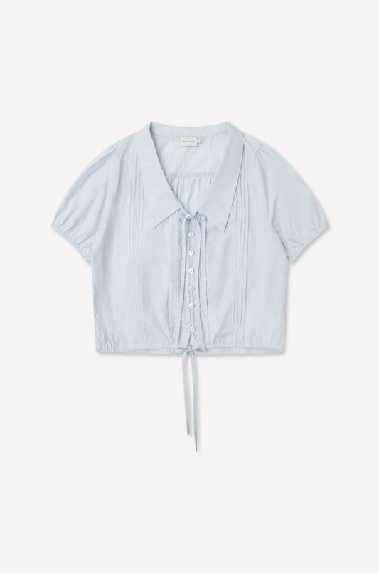 The Fine Collar Top - Mist Stripe features a light blue vertical stripe design, short sleeves, fine collar, button-down front, and drawstring waist. Made from lightweight cotton poplin for a casual, airy look inspired by Deiji Studios.