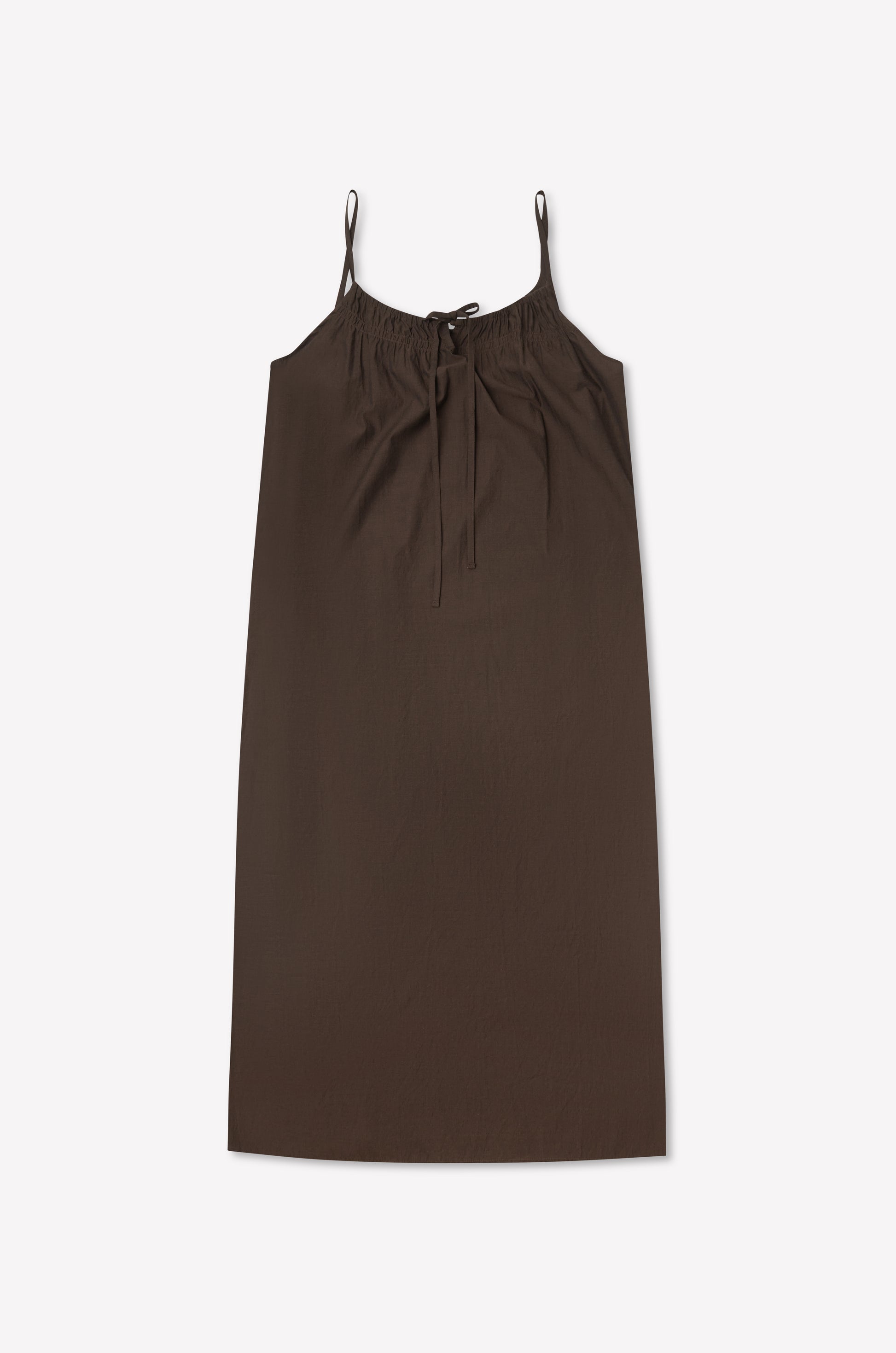 The Light Maxi Dress - Toast by Deiji Studios is a sleeveless, knee-length brown dress with thin straps and a gathered neckline tied with a bow, shown flat on a light background.