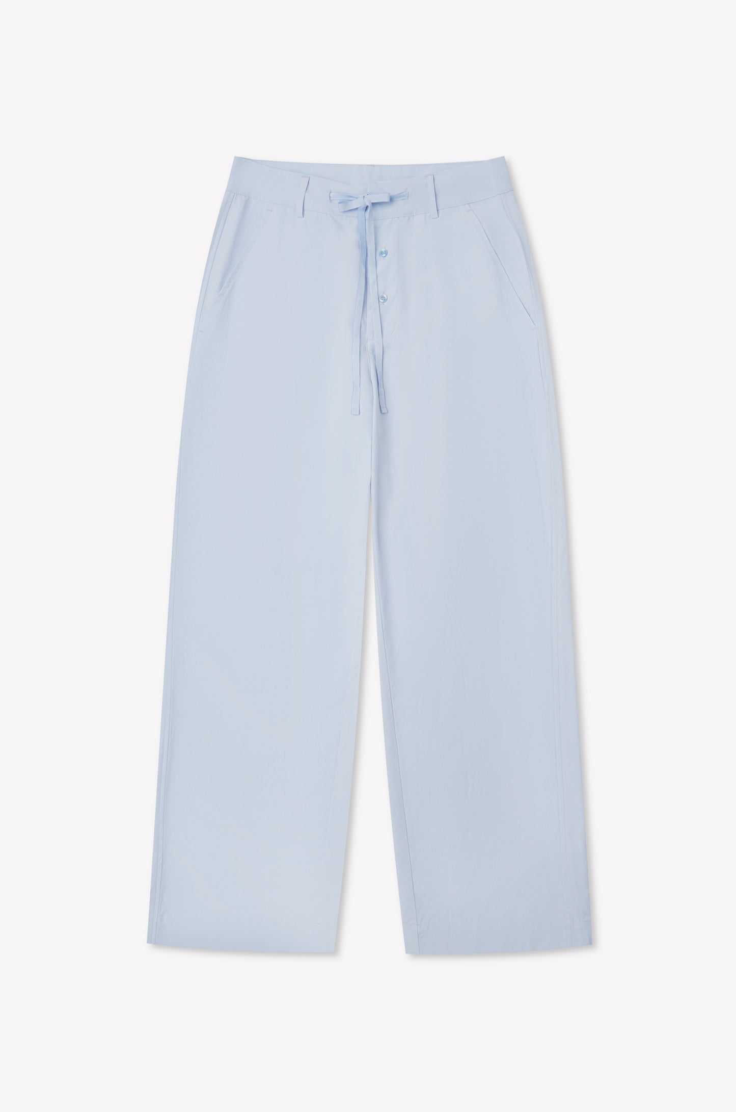 Powder blue Panel Leg Pant by Deiji Studios featuring a wide-leg silhouette, drawstring waist, front button closure, and side pockets, shown laid flat on a white background.
