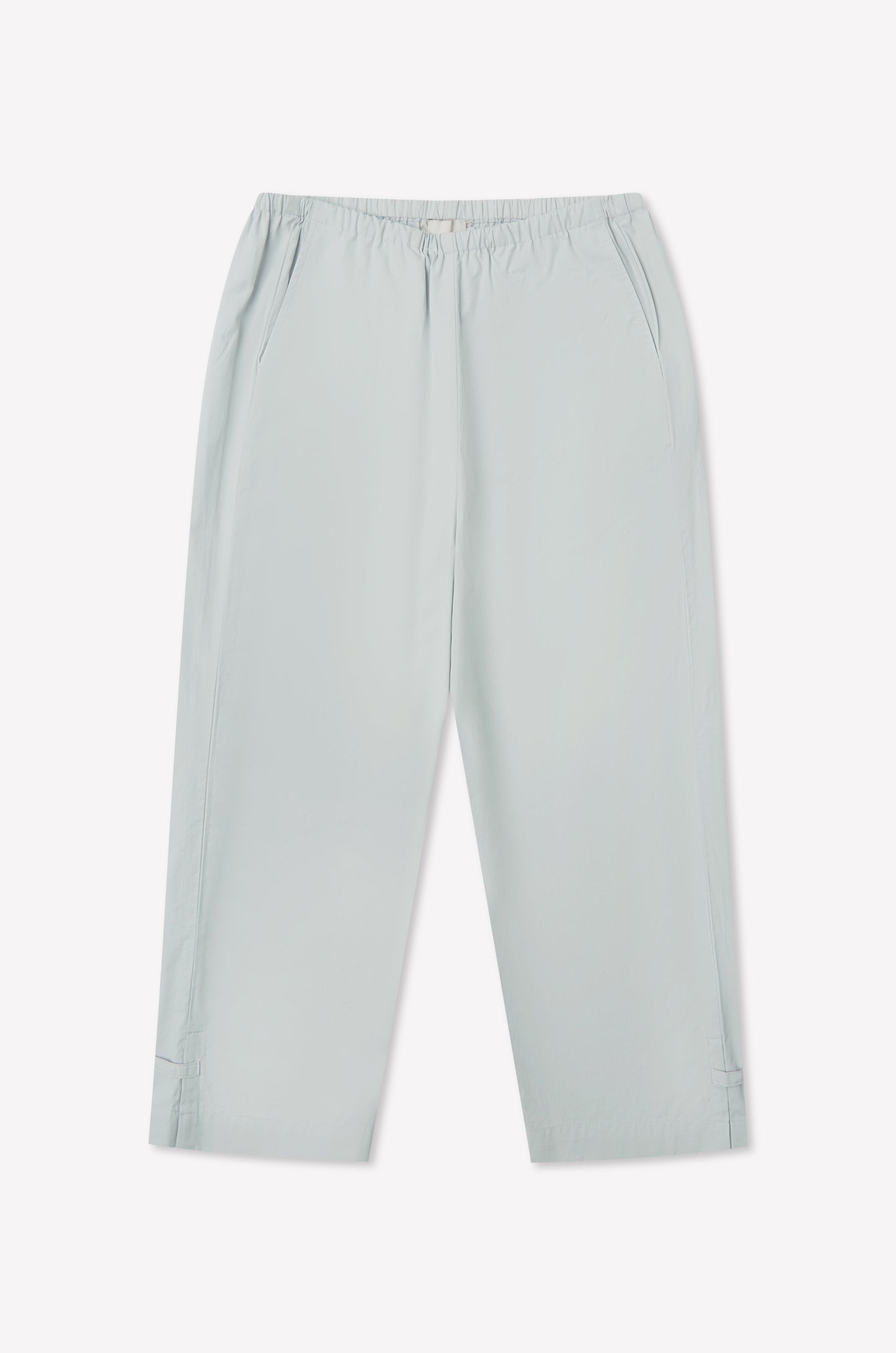 Baby blue Capri Pant featuring a relaxed cropped fit, elasticated waistband, side pockets, and subtle seam details at the hem, laid flat on a white background.
